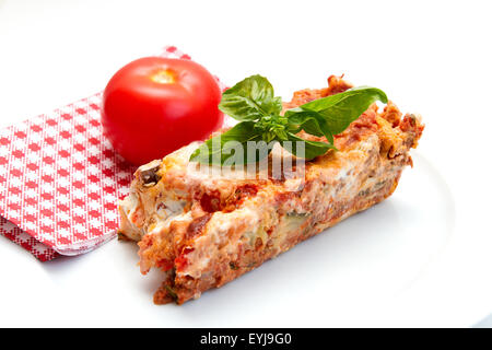 Lasagna/Cannelloni with tomato and basil Stock Photo