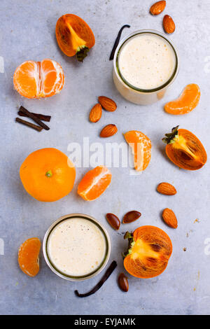 Two glasses of persimmon smoothie shot from above Stock Photo