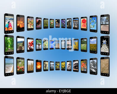 modern mobile phones with different colored images Stock Photo