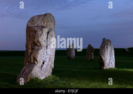 Part of the stone circle at Avebury, Wiltshire, sidelit in the evening. Stock Photo