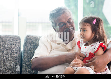 Portrait Indian family at home. Grandparent and grandchild playing together. Asian people living lifestyle. Grandfather and gran Stock Photo