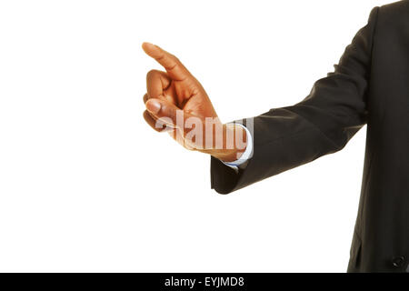 African hand using virtual touchscreen with his index finger Stock Photo