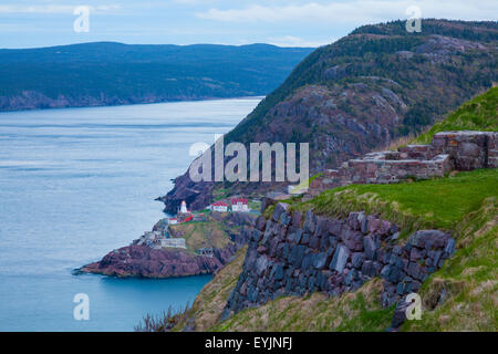 Fort Amherst lighthouse and ruins at dusk from Signal Hill, St. John's, Newfoundland, Canada. Stock Photo