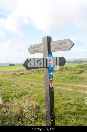 Direction arrow signs prehistoric Ridgeway long distance route way, near Overton Hill, Marlborough Downs, Wiltshire, England, UK Stock Photo