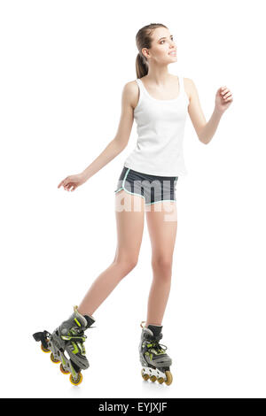 young pretty woman on roller skates Stock Photo