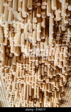 Rows of wooden rounded shanks Stock Photo