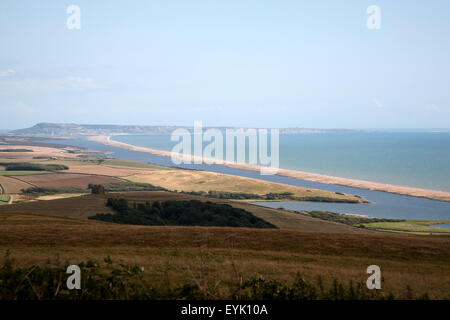 View west along the Fleet and Chesil beach tombolo from Abbotsbury to the Isle Portland, Dorset, England, UK Stock Photo