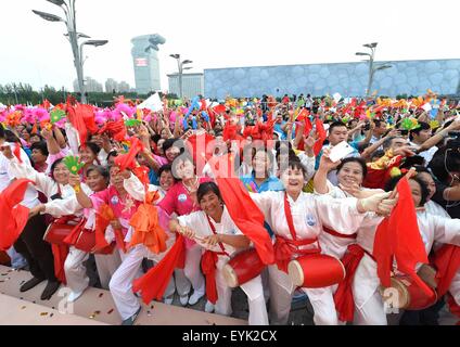 Beijing, China. 31st July, 2015. People gather to celebrate at the Olympic Green in Beijing, capital of China, July 31, 2015. Beijing, together with its neighbor city Zhangjiakou, won the bid to host the 2022 Olympic Winter Games. Credit:  Rao Aimin/Xinhua/Alamy Live News Stock Photo