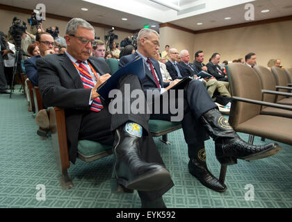 Austin, Texas USA July 30, 2015: Texas Dept. of Public Safety's Robert Bodisch, l, and Col. Steve McCraw take notes as Texas officials continue to investigate the death of Sandra Bland, who died July 13th in the Waller County jail after a traffic stop near Houston. The hearing at the Texas Capitol drew dozens of legislators and activists wanting answers after Bland's apparent jail suicide. Credit:  Bob Daemmrich/Alamy Live News Stock Photo