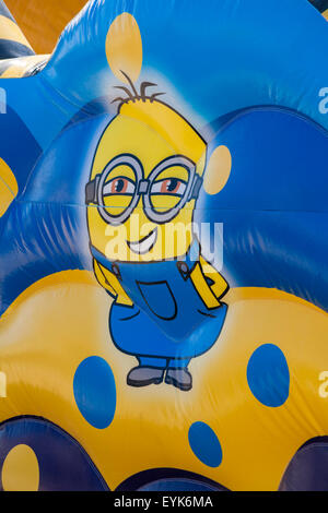 Close up detail of Minion on Minions bouncy castle at Bournemouth beach, Bournemouth, Dorset UK in July Stock Photo