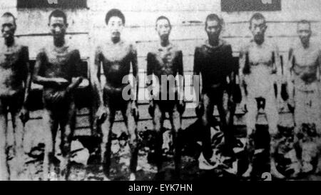 (150731) -- BEIJING, July 31, 2015 (Xinhua) -- File photo copy shows Chinese forced labors in Hanaoka, Japan. Japan invaded northeast China in 1931 and conducted a full-scale invasion in 1937. By the end of World War II, millions of Chinese forced laborers had been enslaved by Japanese invaders to toil under harsh conditions at mines and factories in northeast China and Japan. Those laborers were under close watch and suffered inhumane treatment. Many of them died from malnutrition, illness, physical abuse and plain murder. (Xinhua) Stock Photo