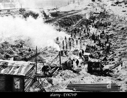(150731) -- BEIJING, July 31, 2015 (Xinhua) -- File photo copy shows Chinese forced labors working for Japan to build the Fengman hydropower station in Jilin of northeast China after the region was illegally occupied by Japanese invaders in 1931. Japan invaded northeast China in 1931 and conducted a full-scale invasion in 1937. By the end of World War II, millions of Chinese forced laborers had been enslaved by Japanese invaders to toil under harsh conditions at mines and factories in northeast China and Japan. Those laborers were under close watch and suffered inhumane treatment. Many of them Stock Photo