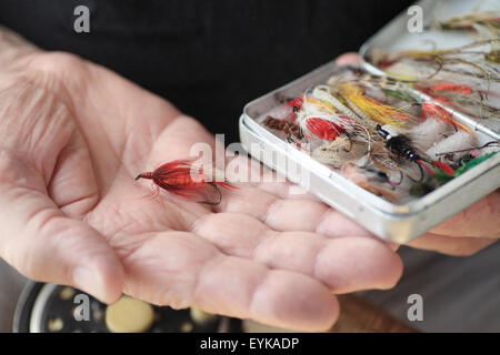 Flies for Fly fishing in box Stock Photo - Alamy