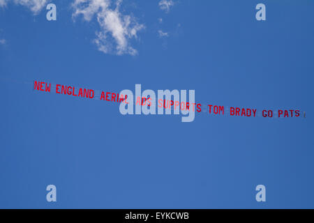 July 31, 2015; Foxborough, MA, USA: A plane with a banner in support of Tom Brady flies over Gillette Stadium during Patriots training camp. Credit:  Cal Sport Media/Alamy Live News Stock Photo