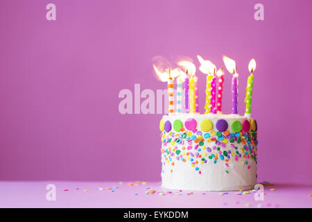 Birthday cake on a pink background Stock Photo