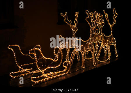 Outdoor christmas decoration: Santa's sleigh. Reindeer Stock Photo