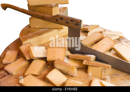 knife for cutting cheese and a piece of cheese on white background Stock Photo