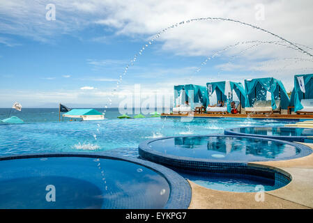 Mantanar Beach Club swimming pool and lounge chairs; Puerto Vallarta, Jalisco, Mexico. Stock Photo