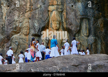 Sri Lanka, Ceylon, Central Province, Buduruwagala, Buddhist Rock Temple, Buddhist statues carved in a rock as rock relief, schoo Stock Photo