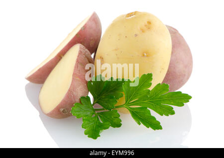 New potatoes and green parsley isolated on white background close up. Stock Photo