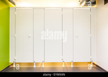 Mens restroom in an public building whit white doors Stock Photo