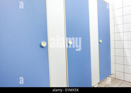 Mens restroom in an public building in blue doors Stock Photo