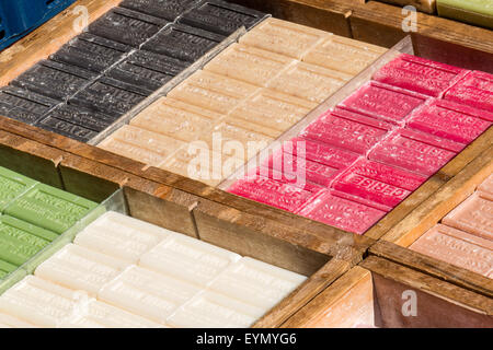 Assortment of bars of soap for sale on the market