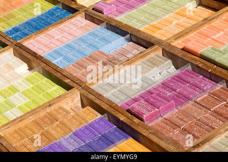 Assortment of bars of soap for sale on the market