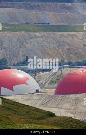 Domes covering stockpiles of processed ore to reduce dust emissions, Highland Valley copper mine, Logan Lake, British Columbia Stock Photo