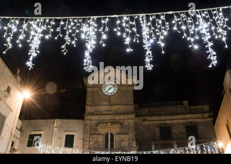 clock tower and illumination in Cisternino Stock Photo