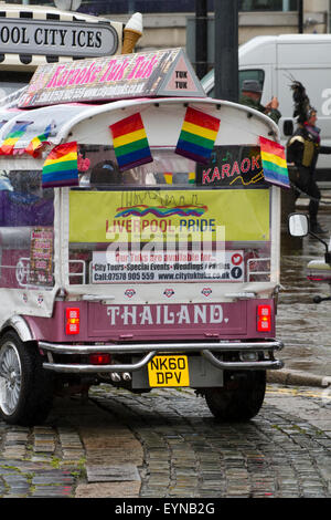 Custom-made THAI-STYLE tuk tuks, electric auto-rickshaws, Liverpool, Merseyside, UK Stock Photo