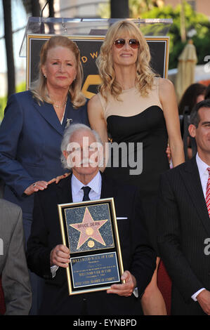 LOS ANGELES, CA - NOVEMBER 1, 2010: Bruce Dern, Diane Ladd their daughter Laura Dern on Hollywood Boulevard where they each were honored with a star on the Hollywood Walk of Fame. Stock Photo