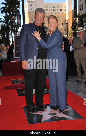 LOS ANGELES, CA - NOVEMBER 1, 2010: Diane Ladd & husband Robert Charles Hunter on Hollywood Boulevard where, together with her ex-husband Bruce Dern & their daughter Laura Dern, she was honored with a star on the Hollywood Walk of Fame. Stock Photo