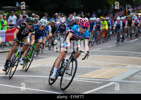 Westminster, London, August 1st 2015. Top women cyclists compete in the Prudential Ride London Grand Prix around St James's Park.