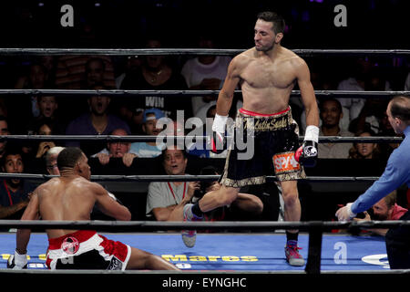 Brooklyn, New York, USA. 1st Aug, 2015. DANIEL JACOBS (red trunks) and SERGIO MORA battle in a middleweight bout at the Barclays Center in Brooklyn, New York. Credit:  Joel Plummer/ZUMA Wire/Alamy Live News Stock Photo