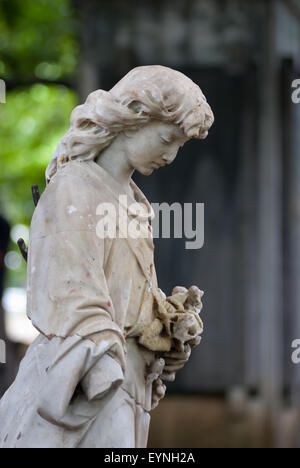 Statue of a mourning woman figure at Taman Prasati museum (museum of memorial stone park) in Jakarta, Indonesia. Stock Photo