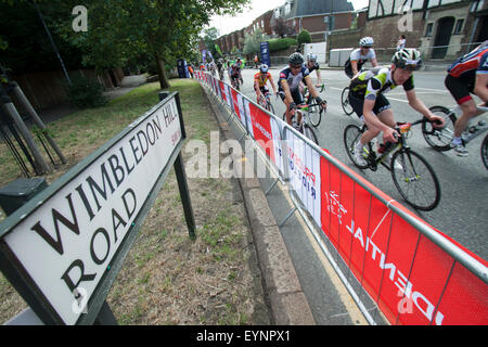 Wimbledon, London, UK. 2nd Aug, 2015. Thousands of riders take part in the Prudential London-Surrey cycling challenge  passing through Wimbledon village route. Credit:  amer ghazzal/Alamy Live News Stock Photo