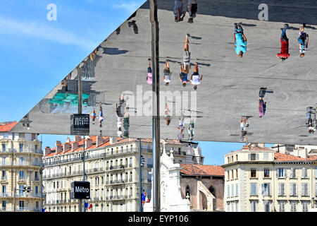 Marseille France Vieux Port Ombriere Norman Fosters thin stainless steel mirror canopy people image reflections seen below at Old Port of Marseilles Stock Photo