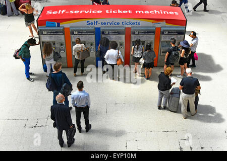 Waterloo London train station aerial view of self service ticket machines on the main concourse at a London mainline railway station England UK Stock Photo
