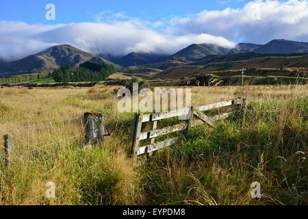 Spectacular rural landscape on State Highway 94 travelling from Dunedin to Te Anau, Southland, South Island, New Zealand Stock Photo