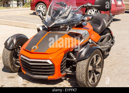 Orange BRP Can-Am Spyder FS Three Wheeler Motorcycle front three quarter view Stock Photo
