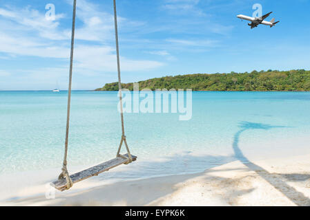 Summer, Travel, Vacation and Holiday concept - Airplane arriving tropical beach sea in Phuket ,Thailand. Stock Photo