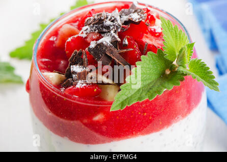 Chia seed pudding with berries and chocolate.  Selective focus Stock Photo