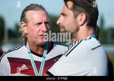 Berlin, Germany. 02nd Aug, 2015. Michael Schulz (L) speaks to Michael Preetz following a soccer match between the DFB Allstars and a team of Maccabi players in Berlin, Germany, 02 August 2015. Photo: GREGOR FISCHER/dpa/Alamy Live News Stock Photo