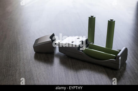 Aug. 3, 2015 - USB charger and green AAA batteries © Igor Goloniov/ZUMA Wire/Alamy Live News Stock Photo