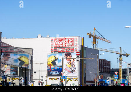 Tallinn, Estonia. 1st Aug, 2015. Pixels and Mission Impossible - Rogue Nation movies billboards on the Coca-Cola Plaza cinema in Tallinn. Pac-Man and Tom Cruise, Jeremy Renner, Simon Pegg, Rebecca Ferguson, Ving Rhames and Alec Baldwin are seen in the billboards. Credit:  Sergey Hmelevskih/Alamy Live News Stock Photo