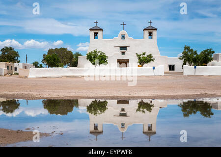 The St. Augustine Church  reflected in a pool of water in the Pueblo of Isleta, New Mexico, USA. Stock Photo