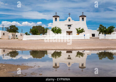 The St. Augustine Church  reflected in a pool of water in the Pueblo of Isleta, New Mexico, USA. Stock Photo