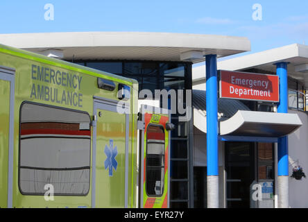 Ambulance vehicle parked outside of hospital emergency department Stock Photo