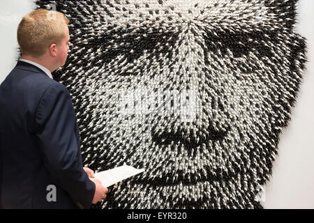 London, UK. 3 August 2015. Barack Obama portrait 'Shoot to Kill' by Joe Black, made of 11,000 toy soldiers. On 10 September 2015 Christie's South Kensington will hold the third annual 'Out of the Ordinary' auction, celebrating all things extraordiary and unusual - from a massive T-Rex to a portrait of Barack Obama made of toys. The preview marks the start of a free five-week summer exhibition, opening to the public on 3 August 2015. Photo: ukartpics/Alamy Live News Stock Photo